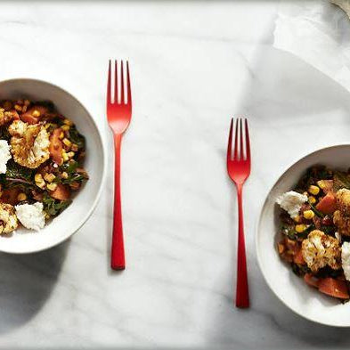 Braised greens with roasted cauliflower, ricotta and mint