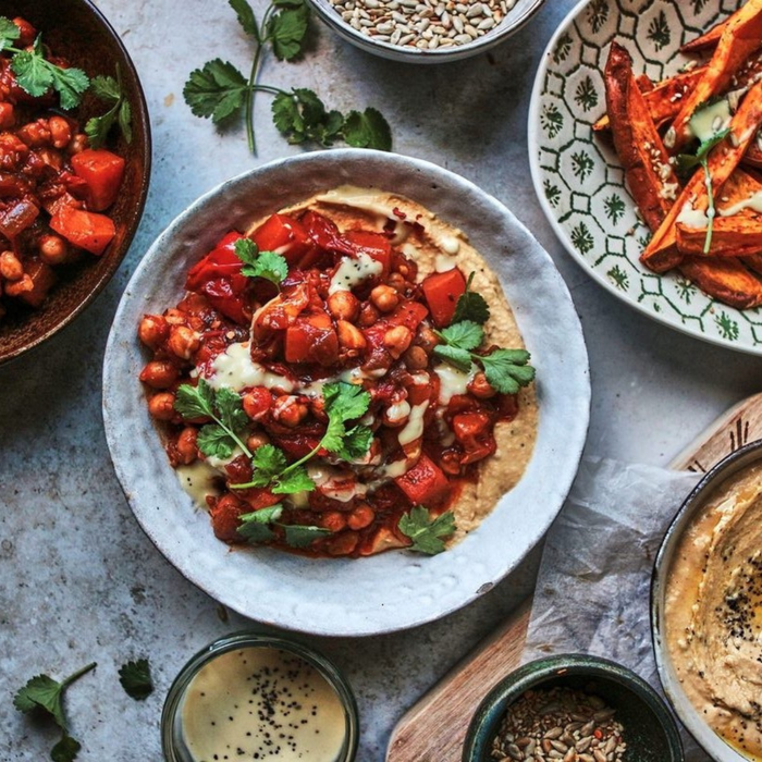 Smoky Sweet Potato, Red Pepper & Chickpea Stew with Sweet Potato Wedges, Creamy Hummus & Toasted Seeds