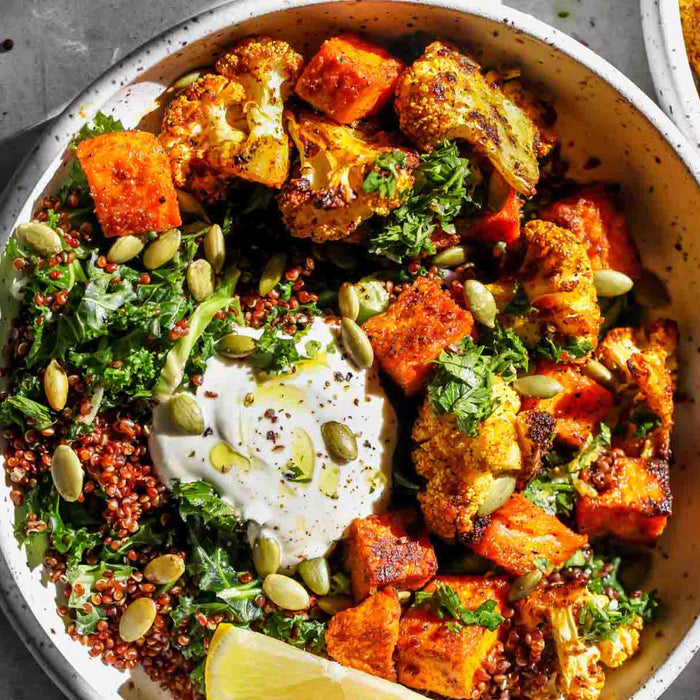 Curried Cauliflower and Sweet Potato Bowls with Cumin Yogurt