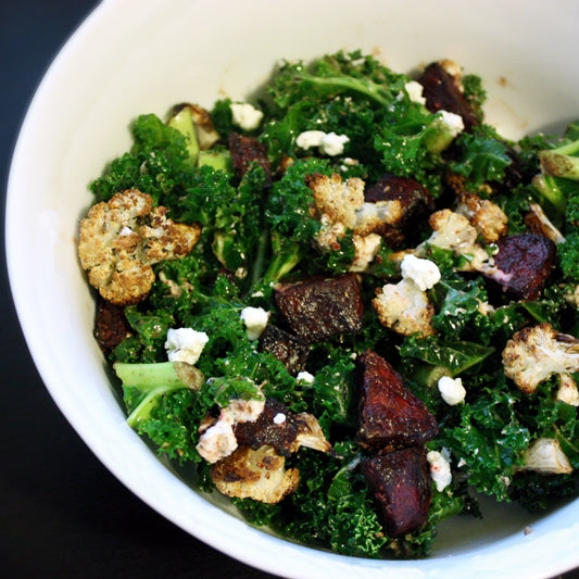 Warm Kale Salad with Roasted Beets, Cauliflower, and Goat Cheese