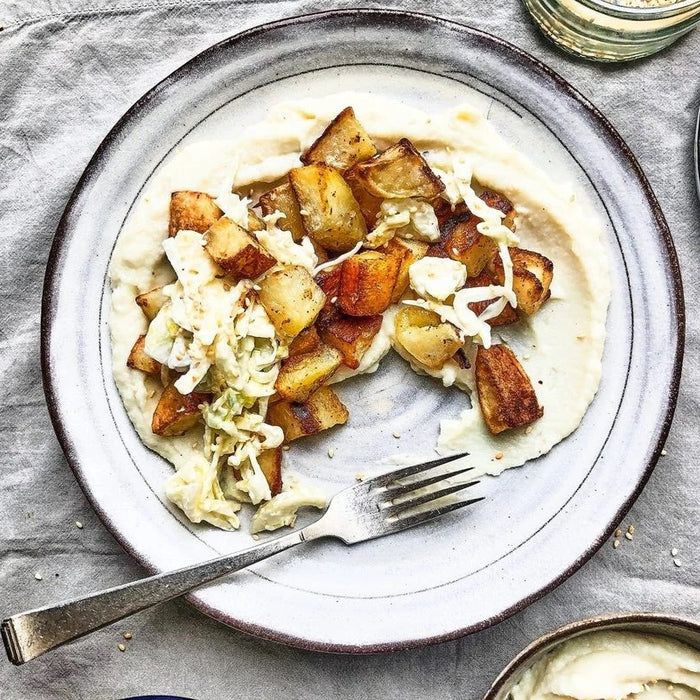 Cauliflower, Parsnip and Roast Garlic Puree with Crispy Roast Potatoes and Fennel Slaw