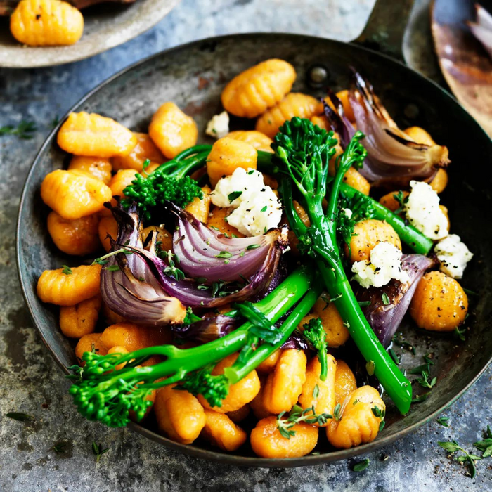 Pumpkin Gnocchi with Broccolini and Red Onion