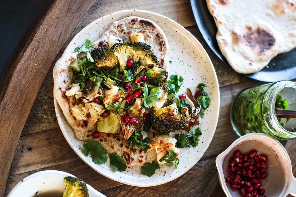 Roast Cauliflower & Broccoli with Crushed Celeriac, Eggplant Dip, Herby Caper Dressing & Flatbread