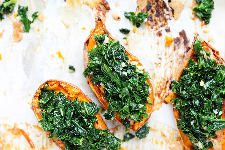 Baked Sweet Potatoes with Garlicky Kale and Almond Butter