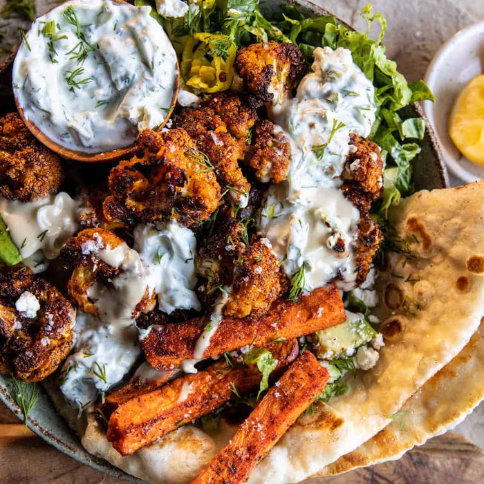 Cauliflower Tzatziki Bowls with Sweet Potato Fries