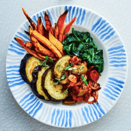 Roast aubergine with goulash sauce & sweet potato fries