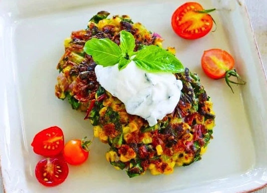 Silverbeet and Corn Fritters with Herbed Goat Cheese Sauce