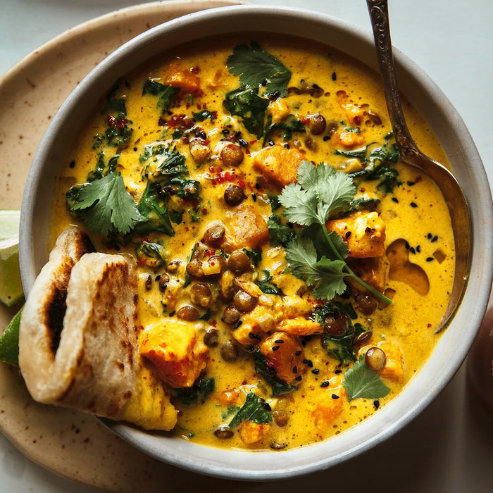Ginger Sweet Potato Coconut Milk Stew with Lentils & Kale