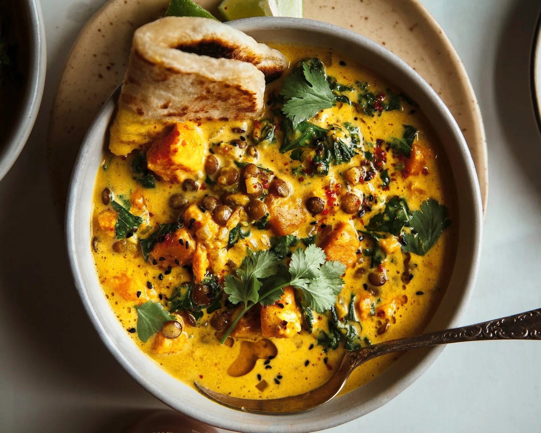 Ginger Sweet Potato Coconut Milk Stew with Lentils & Kale