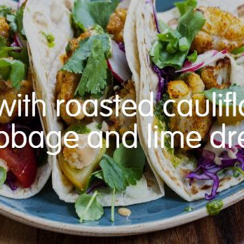 Tacos with roasted cauliflower red cabbage and lime dressing
